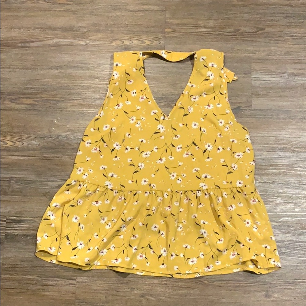 Yellow sleeveless blouse
